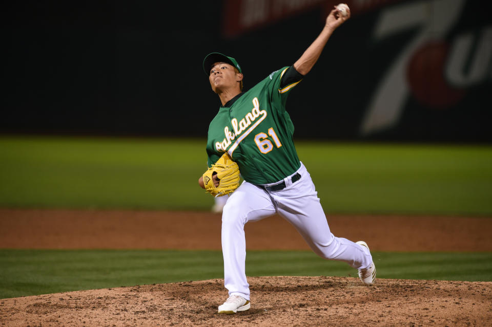 OAKLAND, CA - JULY 25: Oakland Athletics relief pitcher Wei-Chung Wang (61) delivers in the sixth inning of the Major League Baseball game between the Texas Rangers and the Oakland Athletics at the Oakland-Alameda Coliseum on July 25, 2019 in Oakland, CA. (Photo by Cody Glenn/Icon Sportswire via Getty Images)