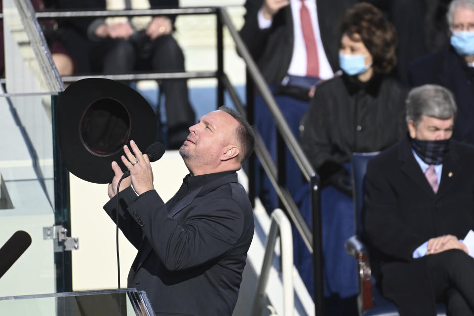 Country singer Garth Brooks sings "Amazing Grace" during the 59th Presidential Inauguration at the U.S. Capitol for President Joe Biden in Washington, Wednesday, Jan. 20, 2021. (Saul Loeb/Pool Photo via AP)