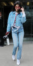 <p>Hadid stepped out in a chic denim-on-denim outfit, paired with white pointed-toe booties and a white graphic tee. Our favorite part of this get-up though has to be the red cat-eye sunglasses (get a similar pair <a rel="nofollow noopener" href="https://click.linksynergy.com/fs-bin/click?id=93xLBvPhAeE&subid=0&offerid=390098.1&type=10&tmpid=8157&RD_PARM1=http%253A%252F%252Fshop.nordstrom.com%252Fs%252Falice-olivia-ludlow-53mm-gradient-lens-cat-eye-sunglasses%252F4620064%253Forigin%253Dcategory-personalizedsort%2526fashioncolor%253DPOPPY&u1=ISBellaHadidStreetStyle3.20JA" target="_blank" data-ylk="slk:here;elm:context_link;itc:0;sec:content-canvas" class="link ">here</a>).</p>