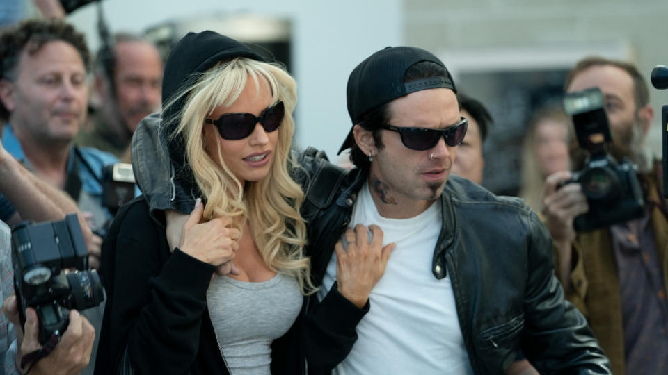 Lily James and Sebastian Stan portray Pamela Anderson and Tommy Lee in this series dramatising their infamous sex tape scandal. (Erin Simkin/Hulu/Disney)                              