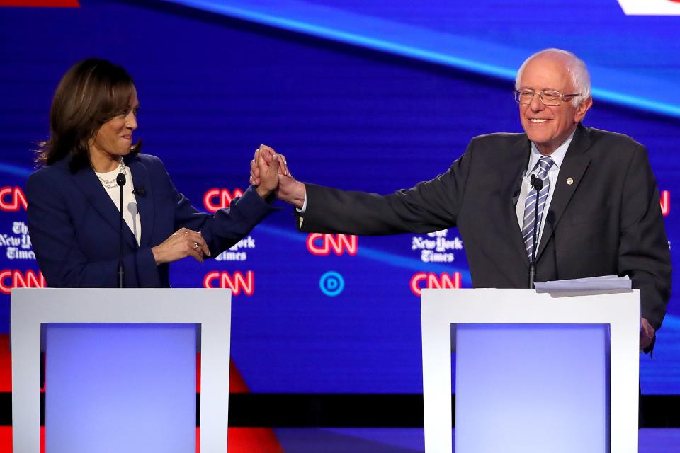 Senator Kamala Harris and Senator Bernie Sanders onstage during the Democratic Presidential Debate on October 15, 2019 in Westerville, Ohio.