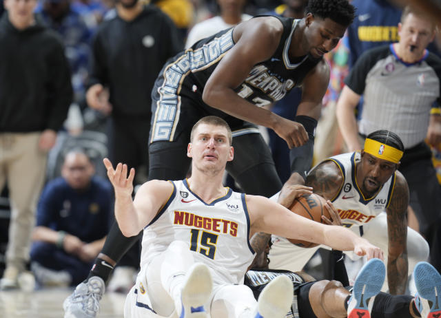 Broncos legend Peyton Manning celebrates Nuggets championship courtside