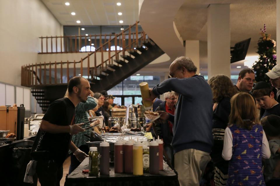 All sorts of holiday food were served to the community before the menorah lighting during the Hanukkah celebrations at the Savannah Civic Center on Sunday, December 10th, 2023.