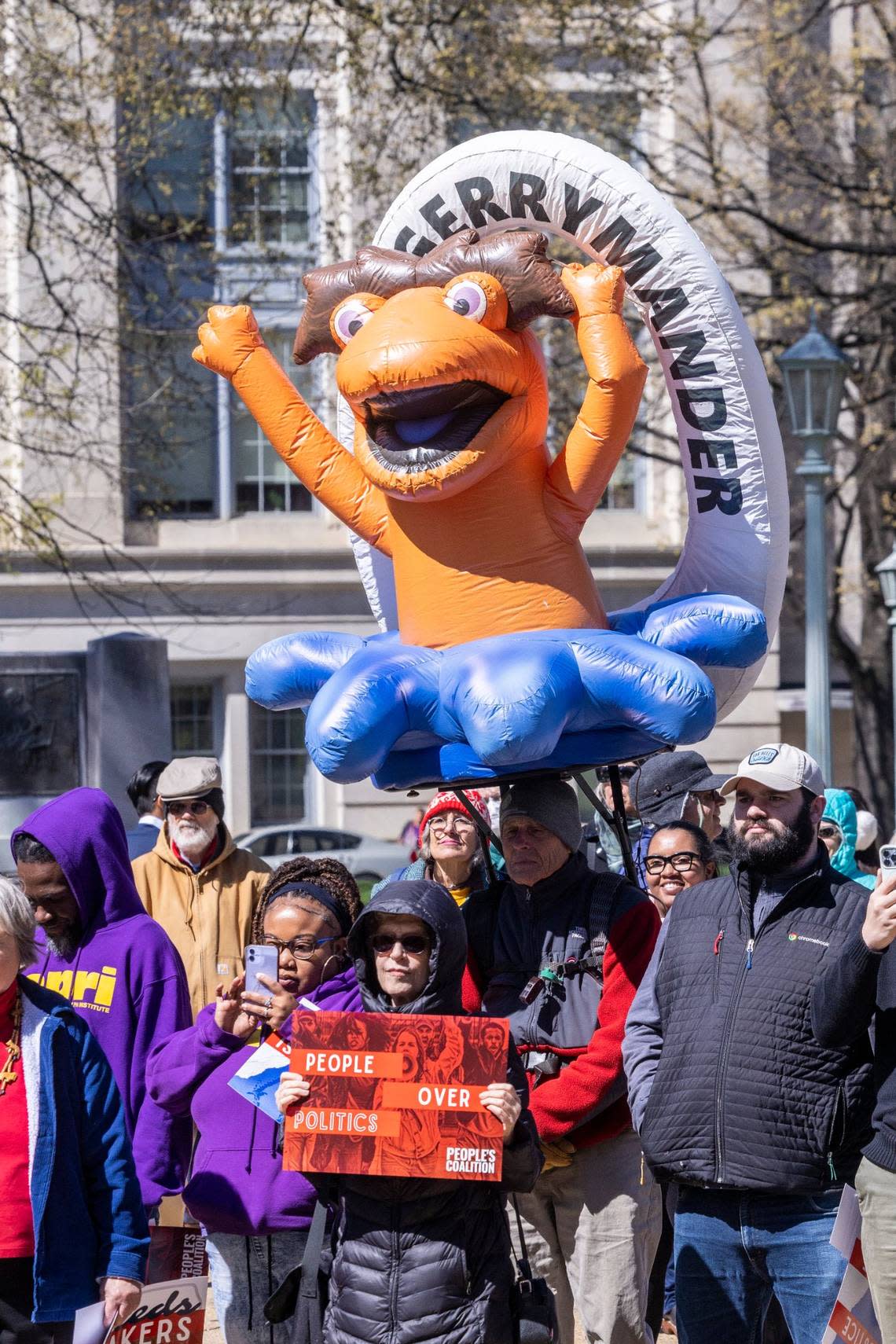 Voting rights activists rally on the state Capitol grounds outside as the NC Supreme Court Tuesday, March 14, 2022 as the court revisited the question of whether partisan gerrymandering is forbidden under the state constitution.