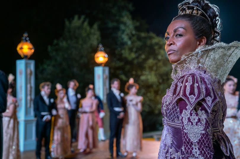 Adjoa Andoh as Lady Danbury in the garden in Bridgerton