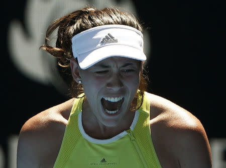 Tennis - Australian Open - Rod Laver Arena, Melbourne, Australia, January 18, 2018. Garbine Muguruza of Spain reacts during her match against Hsieh Su-Wei of Taiwan. REUTERS/Thomas Peter