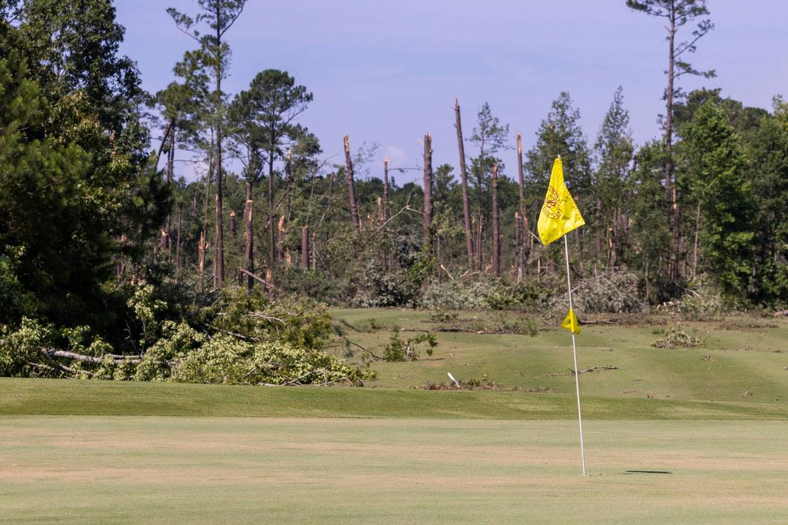 Downed trees show the path of a tornado in the Belmont Lakes Country Club community in Rocky Mount Thursday, July 20, 2023. An EF3, tornado with wind speeds of 150 mph touched down in Nash County Wednesday around 12:30 p.m. Wednesday according to the Raleigh National Weather Service.. Travis Long/tlong@newsobserver.com