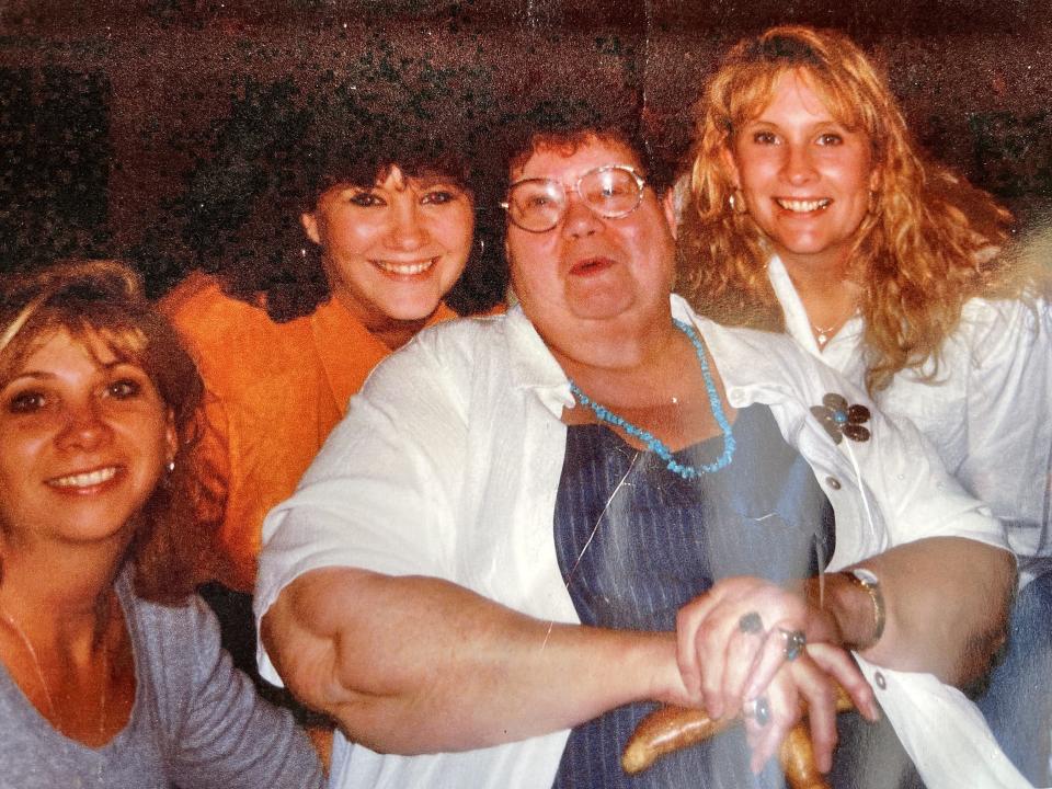 Cheri Pribyl (in orange blouse) with her sisters Joy and Kendra, and the sisters' late mom Christine. A history of cancer runs in the family with Pribyl's grandmother, mother and several aunts having all died of either colon cancer, breast cancer or uterine cancer before the age of 65.