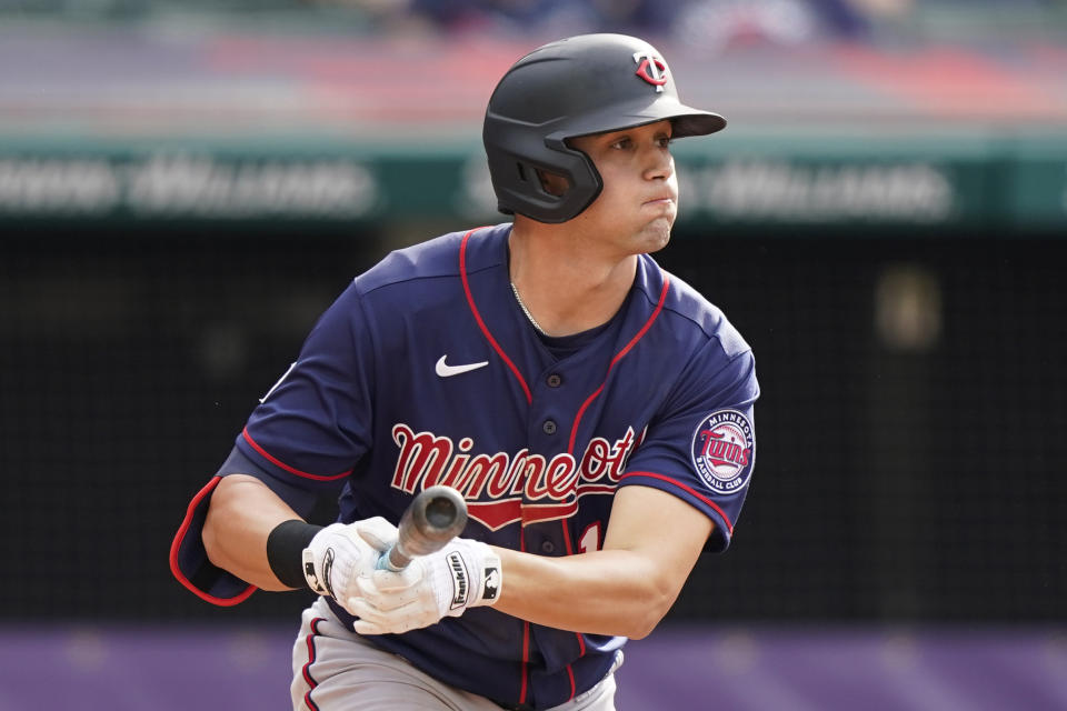 Minnesota Twins' Alex Kirilloff watches his RBI-single in the sixth inning of a baseball game against the Cleveland Indians, Saturday, May 22, 2021, in Cleveland. (AP Photo/Tony Dejak)