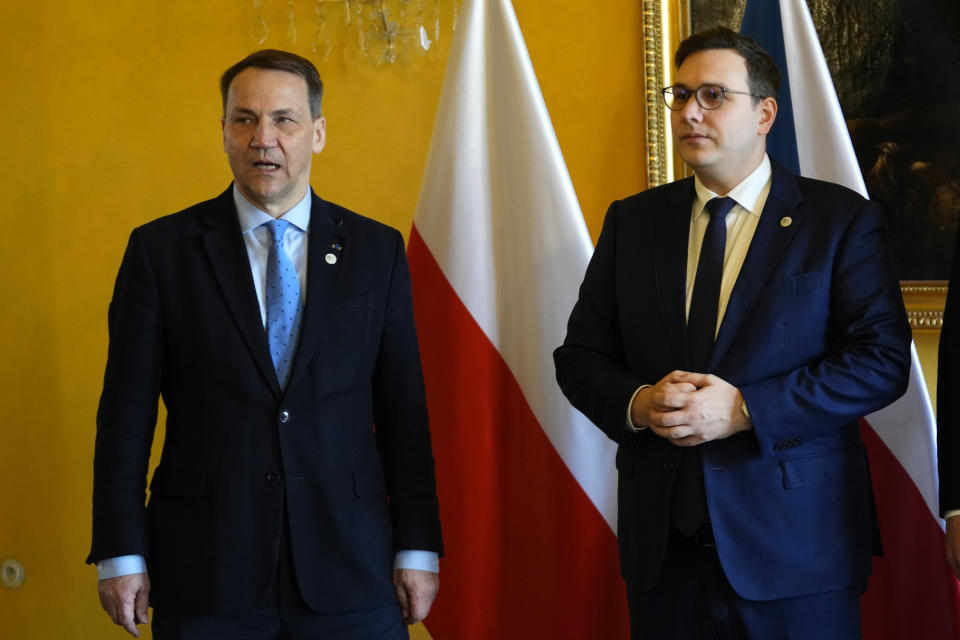 Czech Republic's Foreign Minister Jan Lipavsky, right, and his counterpart from Poland Radoslaw Sikorski, left, pose for a photo as they meet in Prague, Czech Republic, Thursday, March 21, 2024. (AP Photo/Petr David Josek)
