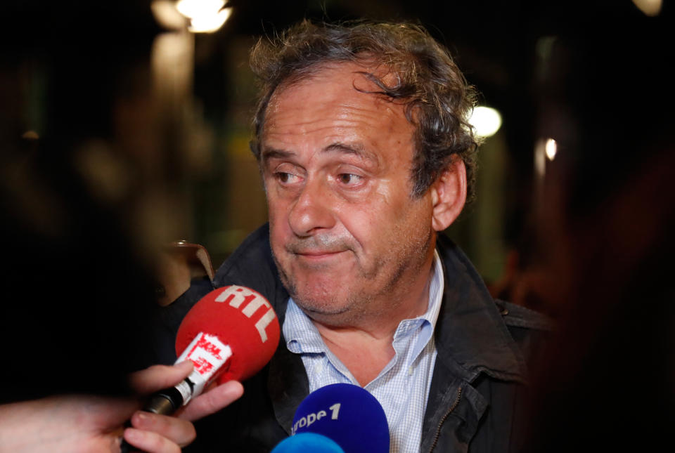 Ex-UEFA chief Michel Platini talks to the media before leaving the Central Office for Combating Corruption and Financial and Tax Crimes after being arrested in connection with a criminal investigation into the award of the 2022 World Cup to Qatar, in Nanterre, west of Paris in the early hours of June 19, 2019. - The banned ex-UEFA chief Michel Platini was freed from French custody Wednesday, an AFP journalist said, after several hours of questioning in connection with a criminal investigation into the awarding of the 2022 World Cup to Qatar. "He is no longer in custody," William Bourdon, the lawyer of the French football legend, said shortly before 1:00 am. There had been "a lot of fuss over nothing", he added. (Photo by Zakaria ABDELKAFI / AFP)        (Photo credit should read ZAKARIA ABDELKAFI/AFP/Getty Images)