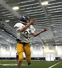 Normally, the indoor practice facility at Highland Park is reserved for football and soccer. This week, the Packers are using it