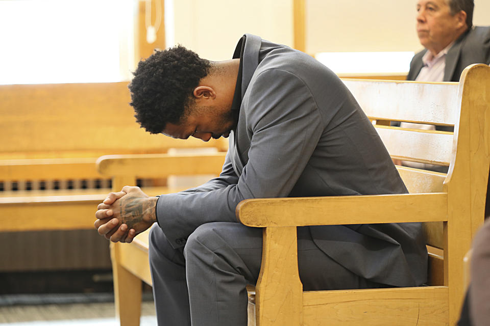 New England Patriots cornerback Jack Jones is seated at his arraignment on gun charges at East Boston Municipal Court, Tuesday, June 20, 2023, in Boston, Mass. Jones was charged with carrying two loaded guns in his carry-on luggage at Logan Airport. (Suzanne Kreiter/The Boston Globe via AP, Pool)