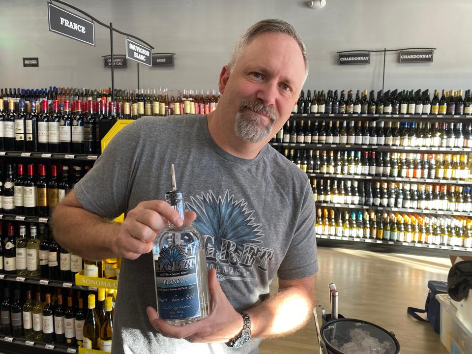 Rob Lombardi, owner of Regret Distillery, based in Raynham, does a tasting at Liquor World in South Easton on Thursday, March 8, 2024.