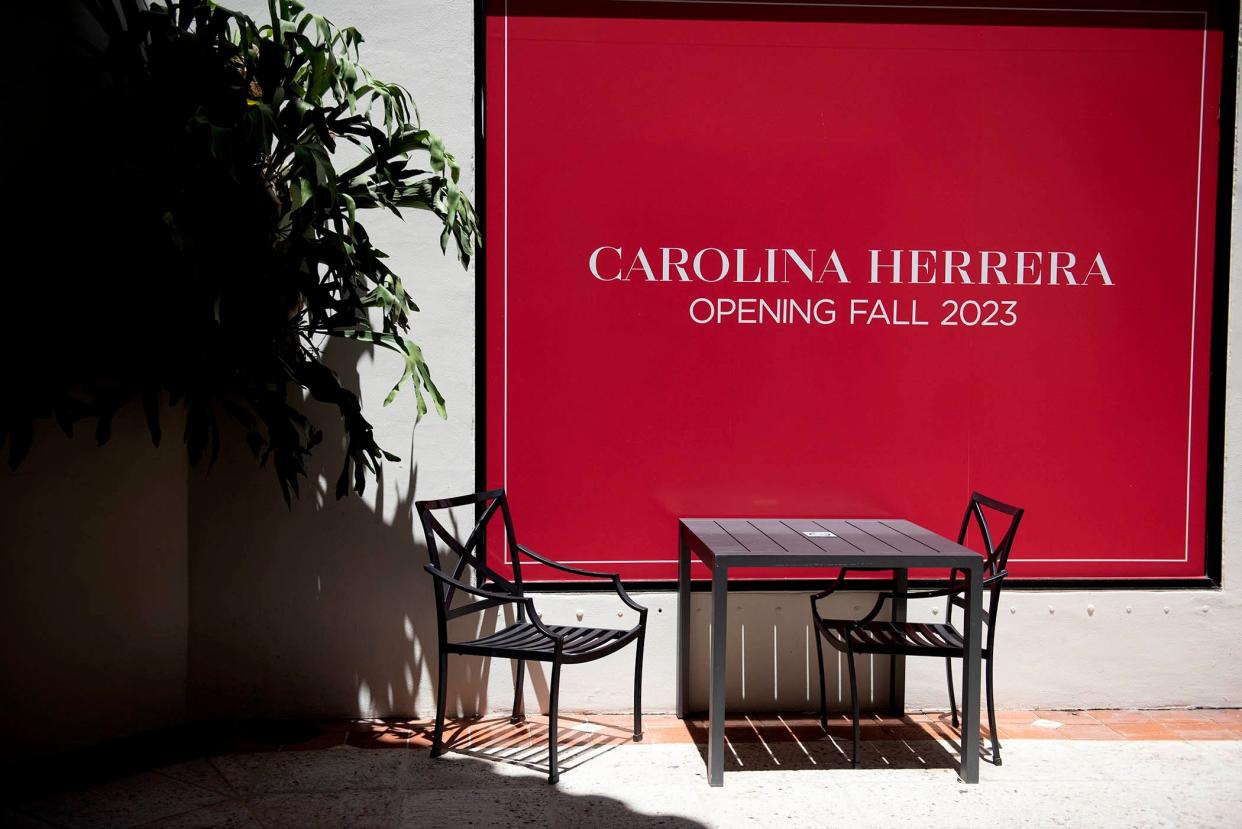 Signage announcing the imminent arrival of the Carolina Herrera boutique at 150 Worth Ave., in the spot previously occupied by Louis Vuitton.