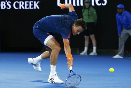 Tennis - Australian Open - Melbourne Park, Melbourne, Australia - 20/1/17 Czech Republic's Tomas Berdych reaches for a shot during the Men's singles third round match against Switzerland's Roger Federer. REUTERS/Edgar Su