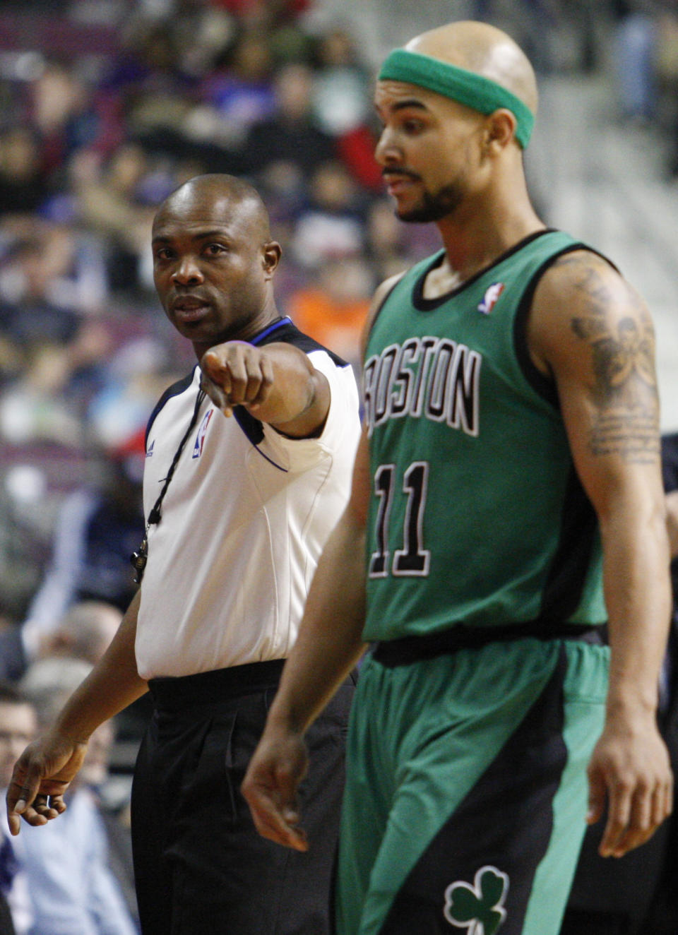 Apr 5, 2014; Auburn Hills, MI, USA; Boston Celtics guard Jerryd Bayless (11) gets called for a foul against <a class="link " href="https://sports.yahoo.com/nba/teams/detroit/" data-i13n="sec:content-canvas;subsec:anchor_text;elm:context_link" data-ylk="slk:Detroit Pistons;sec:content-canvas;subsec:anchor_text;elm:context_link;itc:0">Detroit Pistons</a> forward Kyle Singler (25) during the second quarter at The Palace of Auburn Hills. Raj Mehta-USA TODAY Sports