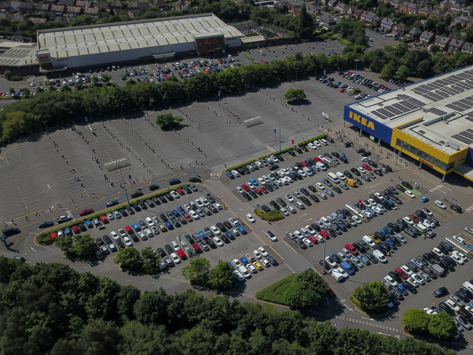 Aerial view of shoppers waiting to get inside the Wednesbury Ikea which has opened today for the first time since it closed due to the Coronavirus lockdown.  (SWNS)