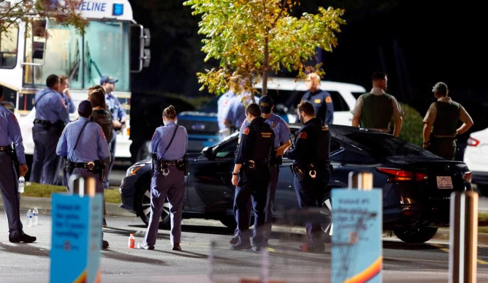 Police gather at the Aldi on New Bern Avenue in Raleigh, Thursday evening, Oct. 13, 2022.