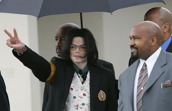 Michael Jackson gestures as he leaves the Santa Barbara County Courts during his molestation trial in 2003. Photo: Getty Images