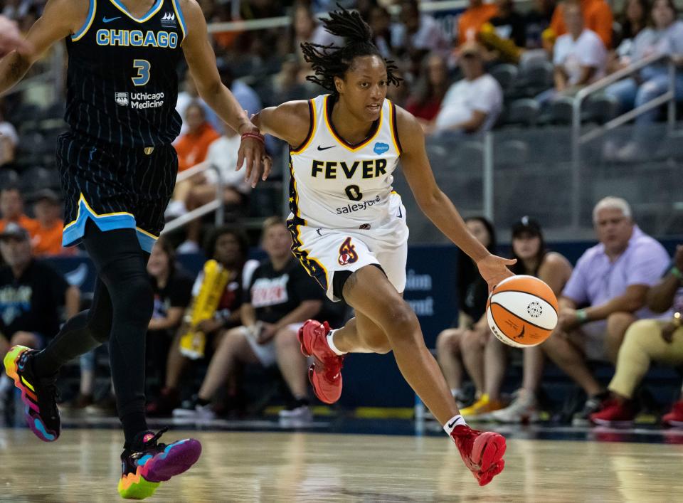 Indiana Fever guard Kelsey Mitchell (0) rushes up the court against Chicago Sky forward Candace Parker (3) on Thursday, July 7, 2022, at Indiana Farmers Coliseum in Indianapolis. 