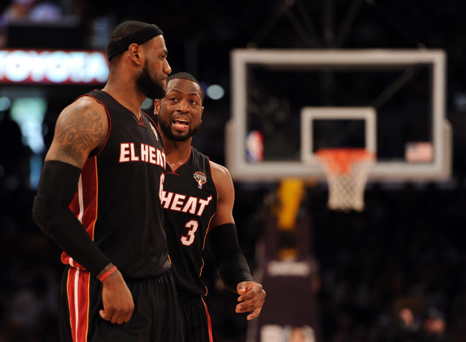 LOS ANGELES, CA - MARCH 04: Dwyane Wade #3 and LeBron James #6 of the Miami Heat talk after a timeout against the Los Angeles Lakers at Staples Center on March 4, 2012 in Los Angeles, California. NOTE TO USER: User expressly acknowledges and agrees that, by downloading and or using this photograph, User is consenting to the terms and conditions of the Getty Images License Agreement. (Photo by Harry How/Getty Images)