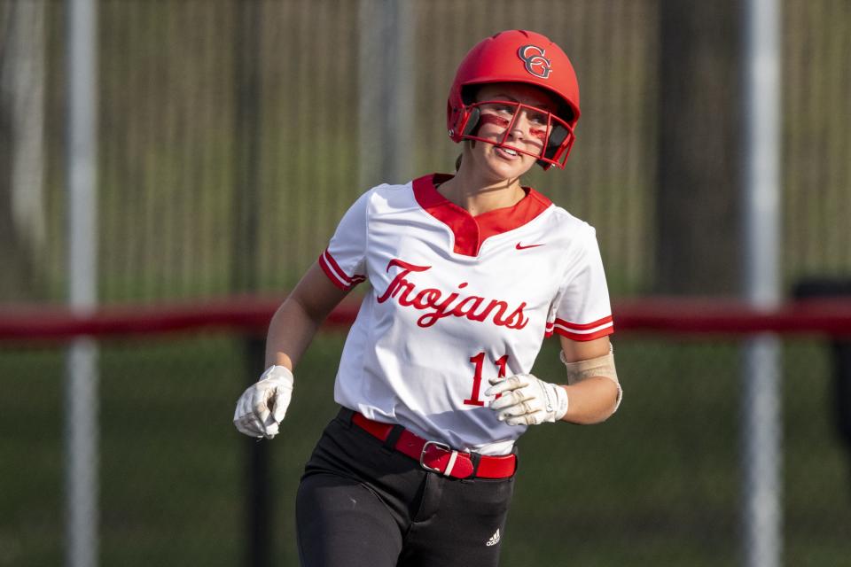 Center Grove High School junior Brooklyn Groppel (11) rounds the bases after hitting a home run during an IHSAA softball game against Pendleton Heights High School, Friday, March 29, 2024. Host Center Grove won, 7-6.