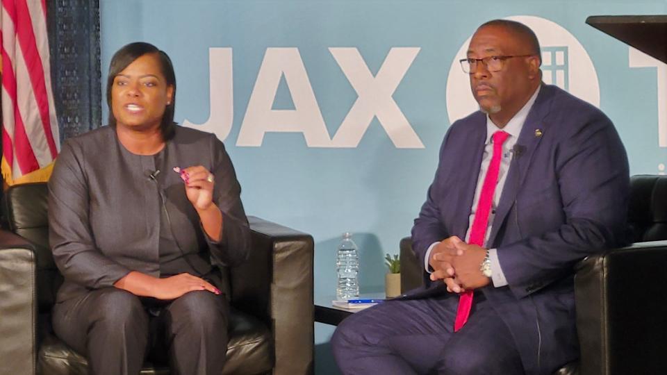 Democrat Lakesha Burton (left) makes a point at a Jacksonville Bar Association and Jacksonville Today election forum with Republican T.K. Waters.