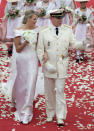 9. Prince Albert II And Charlene Wittstock : Princess Charlene of Monaco and Prince Albert II of Monaco leave the religious ceremony of the Royal Wedding of Prince Albert II of Monaco to Princess Charlene of Monaco in the main courtyard at the Prince's Palace on July 2, 2011 in Monaco.