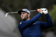 Jon Rahm of Spain, watches his shot on the fourth tee during the final round of the Zozo Championship golf tournament Sunday, Oct. 25, 2020, in Thousand Oaks, Calif. (AP Photo/Ringo H.W. Chiu)