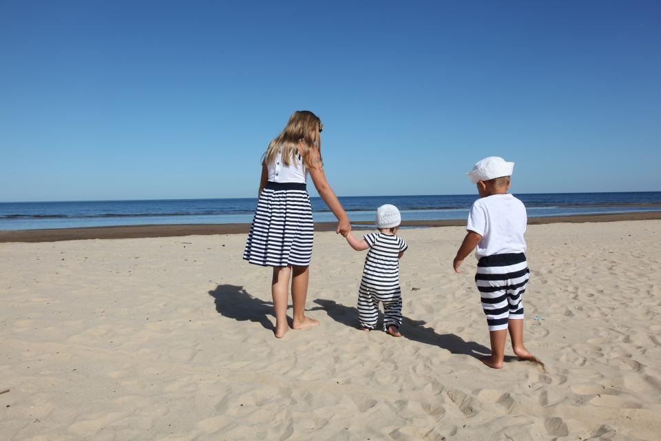 Siblings on beach