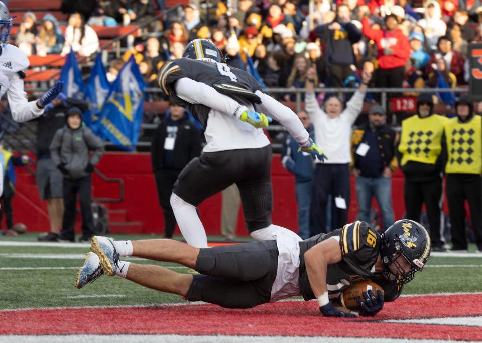 Tom River North Ty Kazanowsky dives for a first half touchdown, Toms River North Football vs Passaic Tech in NJSIAA Group 5 Final in Piscataway, NJ on December 4, 2022. 