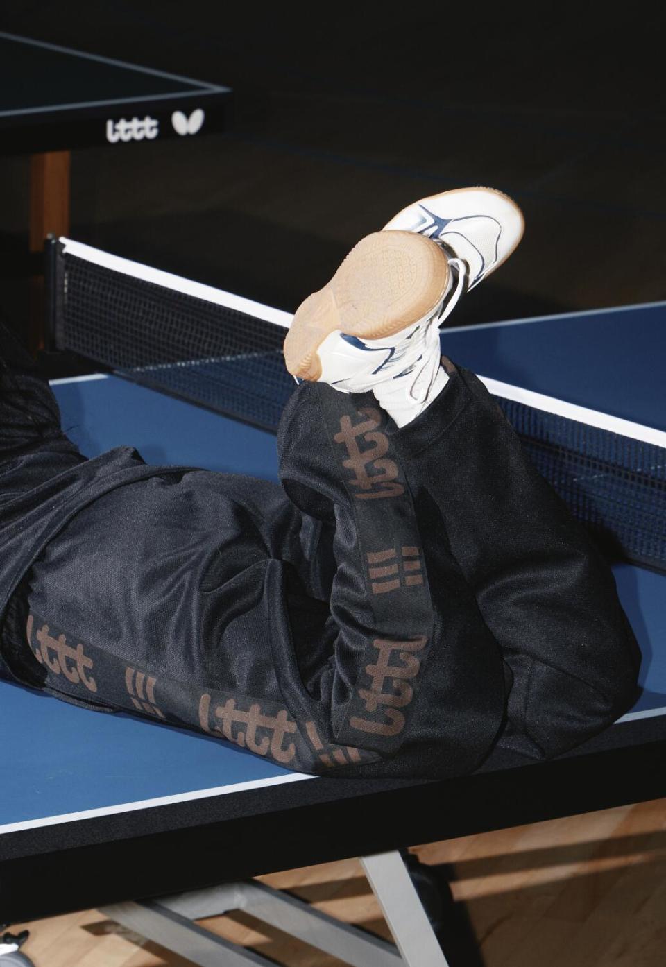 LTTT tracksuit in black and Butterfly table tennis shoes.