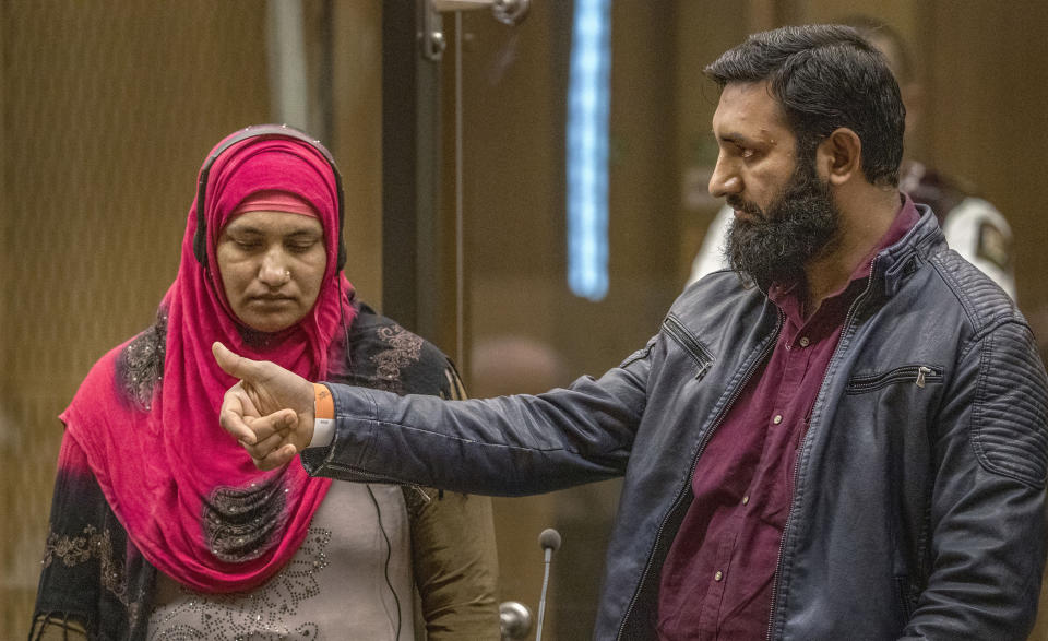 Sahadat Mohammed, right, gives his victim impact statement during the sentencing hearing for Australian Brenton Harrison Tarrant at the Christchurch High Court after Tarrant pleaded guilty to 51 counts of murder, 40 counts of attempted murder and one count of terrorism in Christchurch, New Zealand, Wednesday, Aug. 26, 2020. More than 60 survivors and family members will confront the New Zealand mosque gunman this week when he appears in court to be sentenced for his crimes in the worst atrocity in the nation's modern history. (John Kirk-Anderson/Pool Photo via AP)