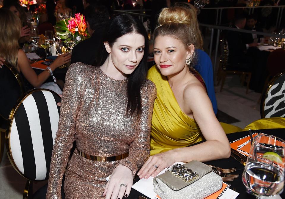 Michelle Trachtenberg and Emilie de Ravin attend the 28th Annual Elton John AIDS Foundation Academy Awards Viewing Party. 