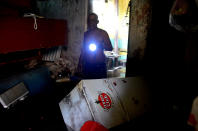 <p>A Cuban with a lantern in a flooded house in downtown Havana, on Sept. 10, 2017.<br> (Photo: Abel Ernesto/AFP/Getty Images) </p>