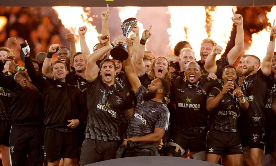 <span>Sharks celebrate with the Challenge Cup trophy after the win against Gloucester.</span><span>Photograph: Tom Jenkins/The Guardian</span>