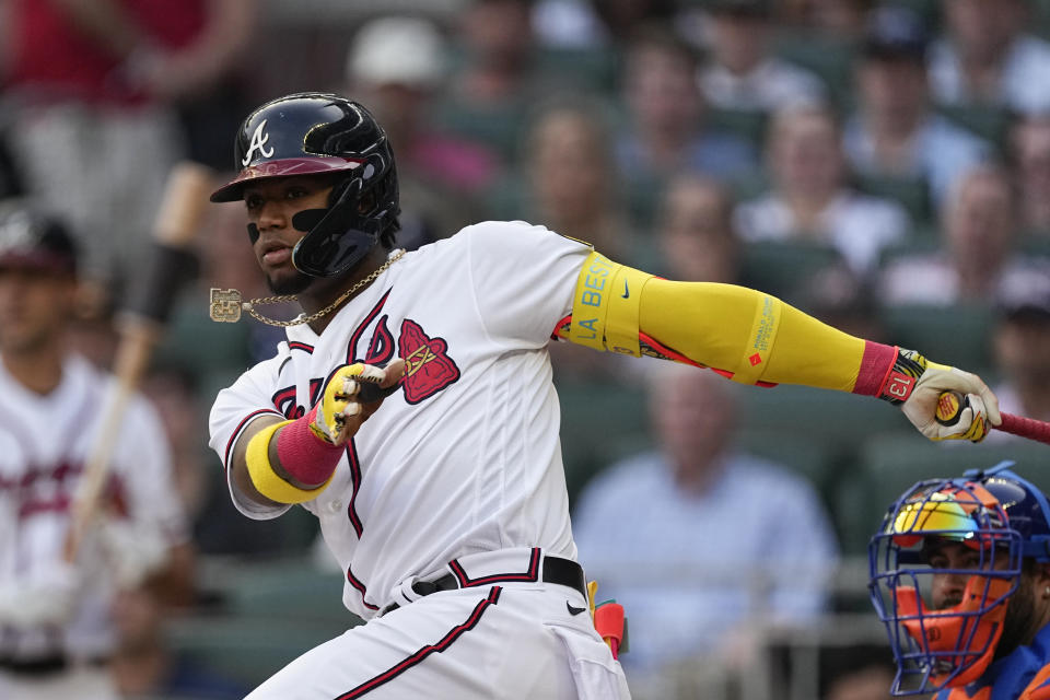Atlanta Braves' Ronald Acuna Jr. watches his double against the New York Mets during the first inning of a baseball game Thursday, June 8, 2023, in Atlanta. (AP Photo/John Bazemore)