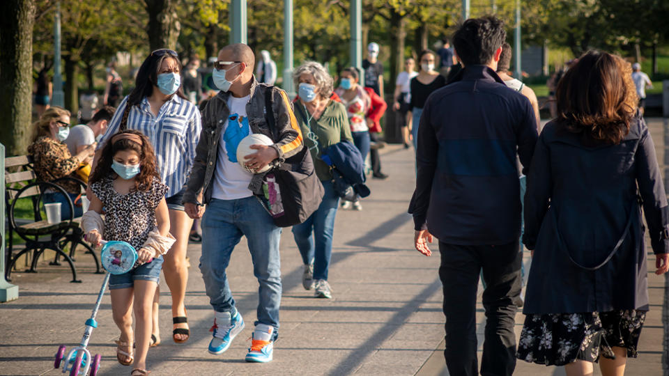 People seen wearing masks near the Hudson River. Source: AAP