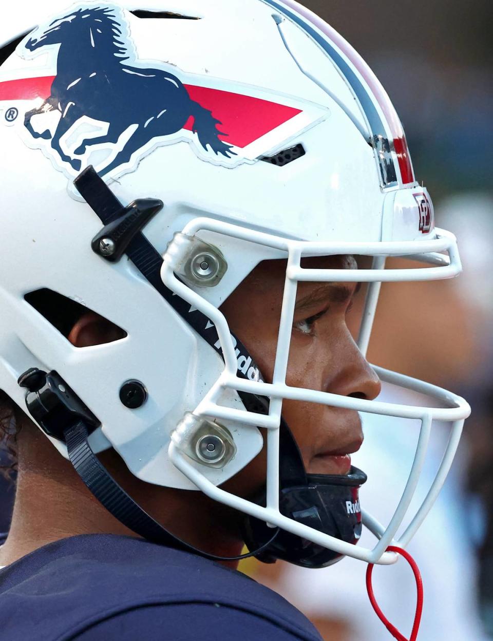 Providence Day quarterback Jadyn Davis watches the defense unit from the team’s sideline during first half action against Charlotte Catholic on Friday, September 1, 2023 at Providence Day School.