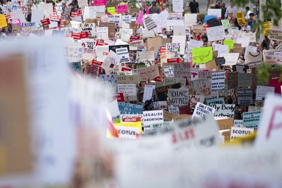 People march through downtown Atlanta in June 2022 to protest the U.S. Supreme Court’s decision to overturn Roe v. Wade. (AP Photo/Ben Gray, File)