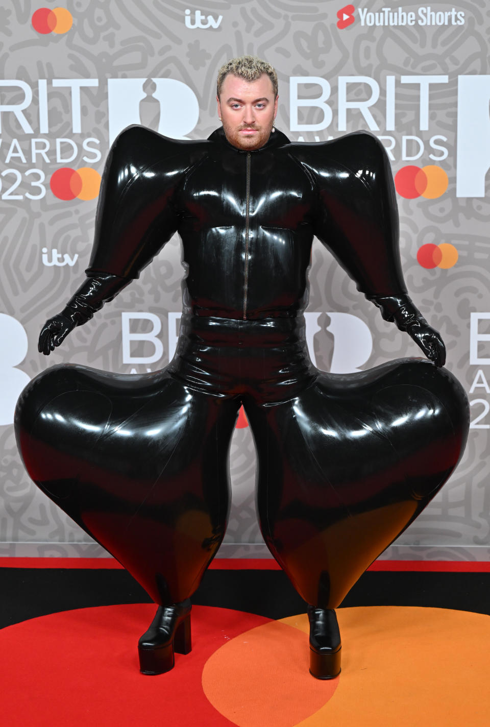 Sam Smith attends The BRIT Awards 2023 at The O2 Arena on February 11, 2023, in London, England, wearing a bespoke Harri look.