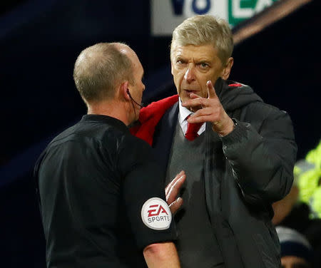 FILE PHOTO - Soccer Football - Premier League - West Bromwich Albion vs Arsenal - The Hawthorns, West Bromwich, Britain - December 31, 2017 Arsenal manager Arsene Wenger remonstrates with referee Mike Dean Action Images via Reuters/Jason Cairnduff