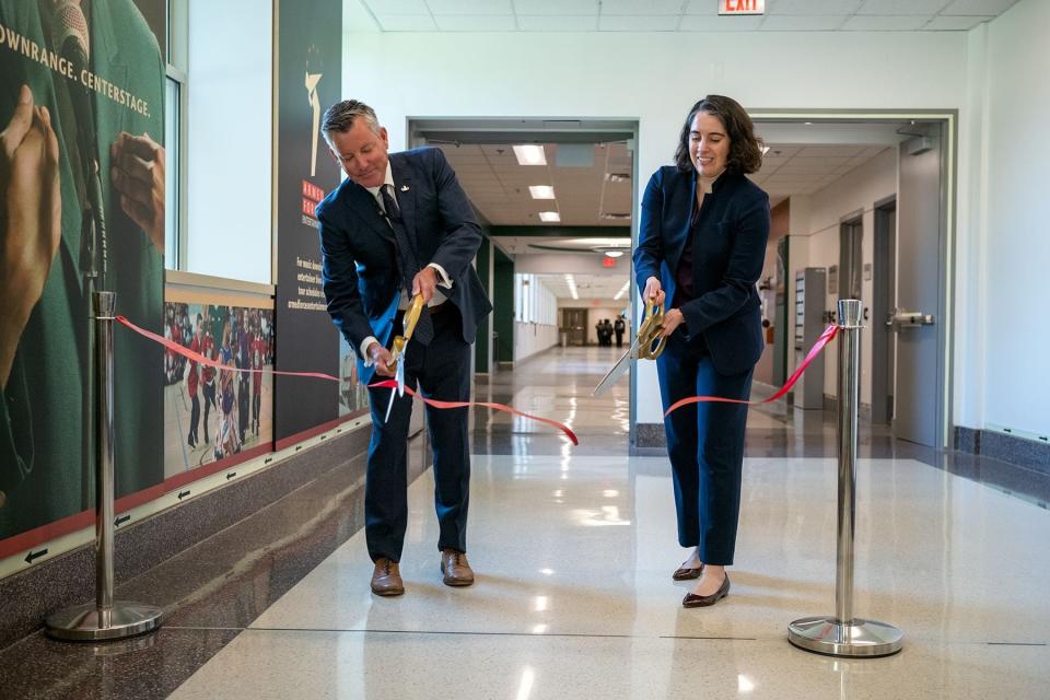 Melissa Dalton, performing the duties of Deputy Under Secretary of Defense for Policy, and Thomas Vail, Senior EOD Plans and Policy Analyst, cut the ribbon at the Pentagon’s new Explosive Ordinance Disposal (EOD) corridor exhibit during its unveiling in Arlington, Va., April 23, 2024.  The EOD Exhibit is the first and only exhibit of its kind in the Pentagon and represents the history, mission, culture, and tools of the Joint EOD Force. (U.S. Army photo by Christopher Kaufmann)