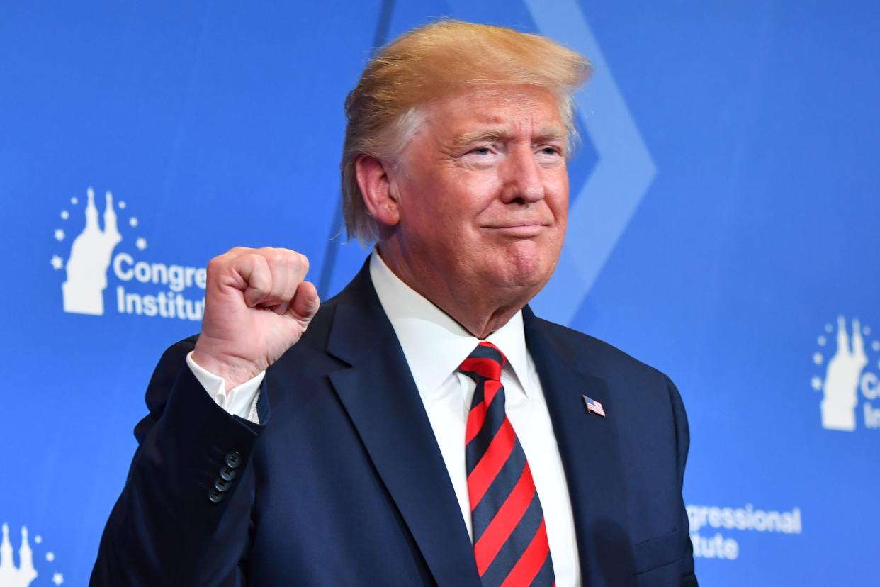 US President Donald Trump pumps his fist during the 2019 House Republican Conference Member Retreat Dinner in Baltimore, Maryland on September 12, 2019. (Photo by Nicholas Kamm / AFP)        (Photo credit should read NICHOLAS KAMM/AFP/Getty Images)