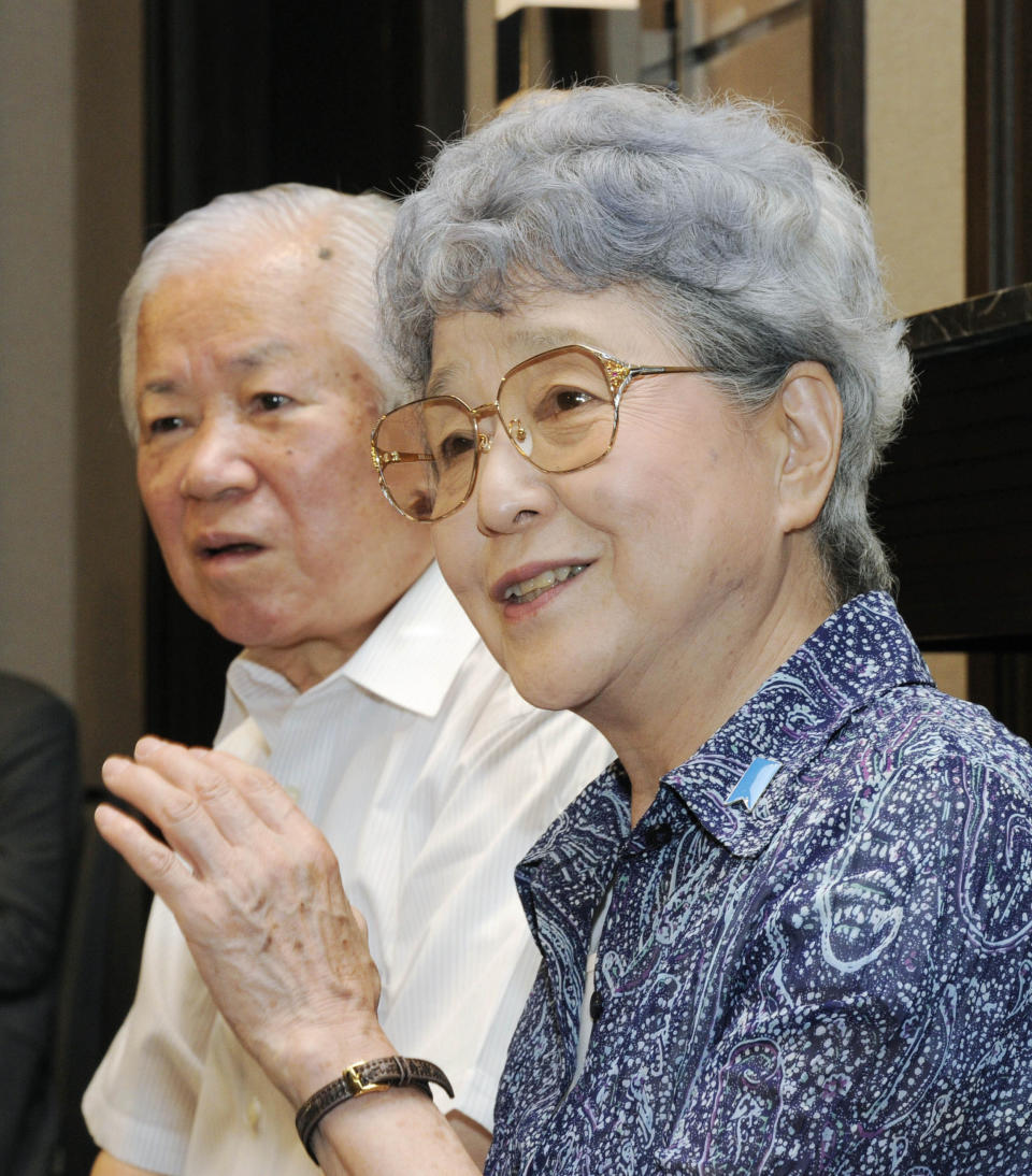 FILE - In this July 22, 2010 file photo, Shigeru, left, and Sakie Yokota, parents of Megumi Yokota, a Japanese national who was abducted by North Korea in 1977, speak at a news conference in Karuizawa, central Japan. Japan's Foreign Ministry confirmed Sunday, March 16, 2014, that the couple spent time with Kim Un Kyong, their Korean-born granddaughter, for the first time over several days last week in Ulan Bator, Mongolia. Kim is 26 years old, Japanese media said. (AP Photo/Kyodo News, File) JAPAN OUT, MANDATORY CREDIT