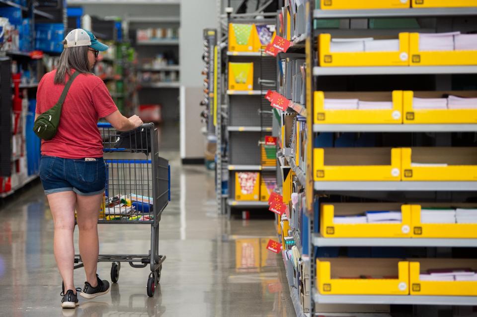 Customers browse through school supplies for sale at the Walmart on Parkside Drive in Turkey Creek, Tennessee in 2023 during Tennessee's annual sales tax holiday.