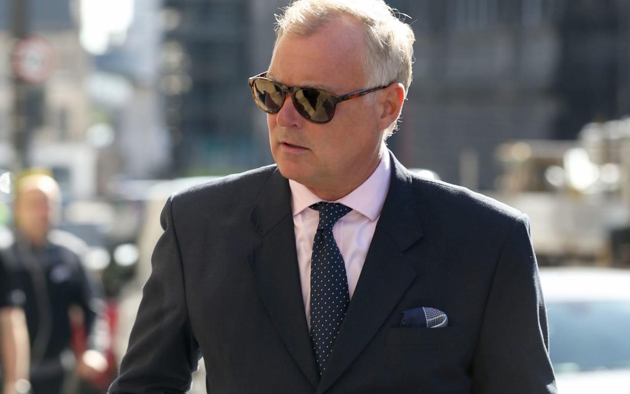 John Leslie has denied grabbing a woman's breasts at a Christmas party in 2008