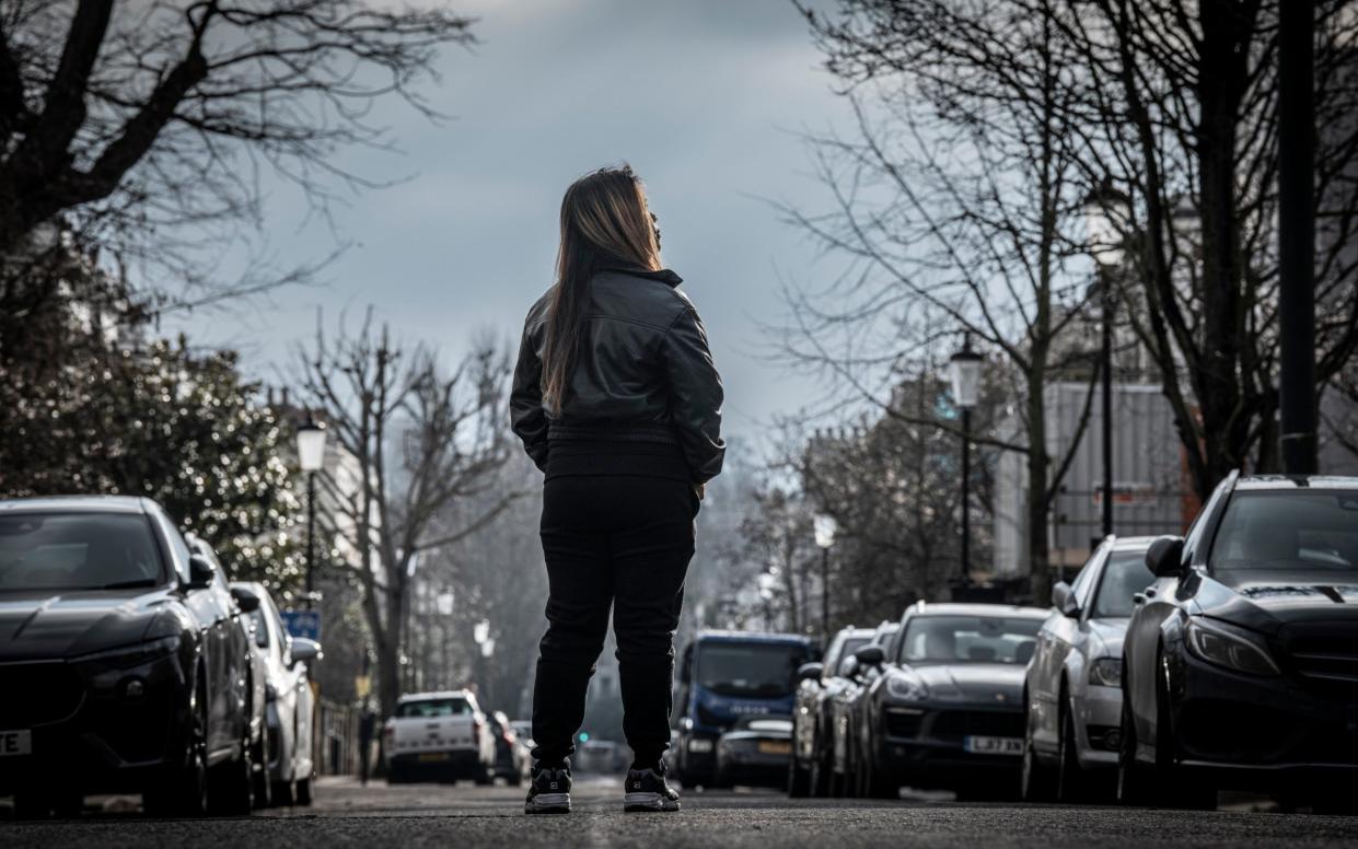 A victim of human trafficking photographed in Holland Park, who escaped an abusive employer - Simon Townsley/The Telegraph