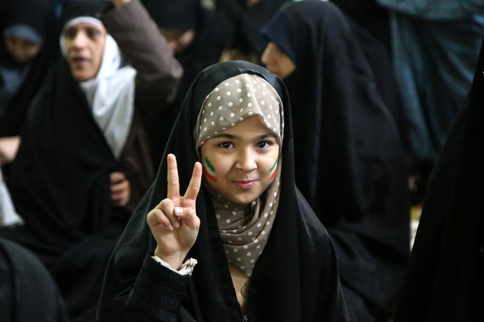 <p>A girl gestures as Senior Iranian cleric Ahmad Khatami conducts Friday sermon (Khutbah) during Friday prayer in Tehran, Iran on Jan. 5, 2018. (Photo: Fatemeh Bahrami/Anadolu Agency/Getty Images) </p>